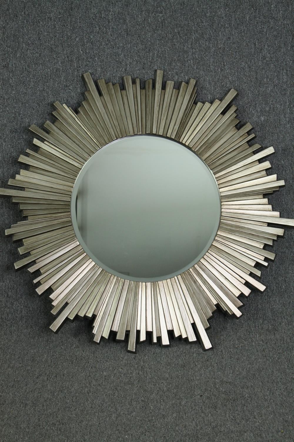 Mirror, contemporary moulded sunburst frame. Dia.100cm.