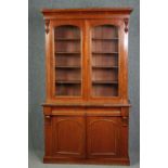 Library bookcase, 19th century mahogany, in two sections. H.211 W.120 D.45cm.