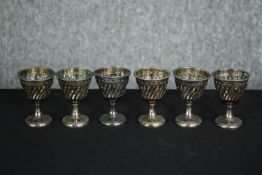 A set of six 19th century pierced silver plated egg cups. H.7cm. (each)