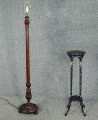 A vintage oak standard lamp and a painted torchere. H.102cm.