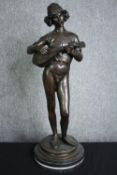 After Paul Dubois (1829-1905), a 19th century patinated bronze figure; Le Chanteur Florentin, a