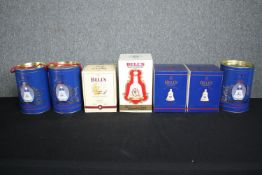 Seven boxed and unopened Bell's Scotch whisky decanters. H.26cm. (largest)