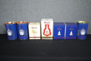 Seven boxed and unopened Bell's Scotch whisky decanters. H.26cm. (largest)