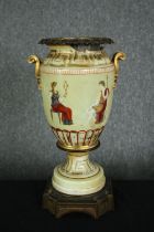 A 19th century ceramic urn, hand decorated with Classical figures with bronze interior and base. H.