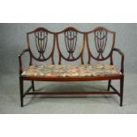 Bench sofa, Georgian style mahogany with triple Hepplewhite shield back. H.102 W.135 D.48cm.