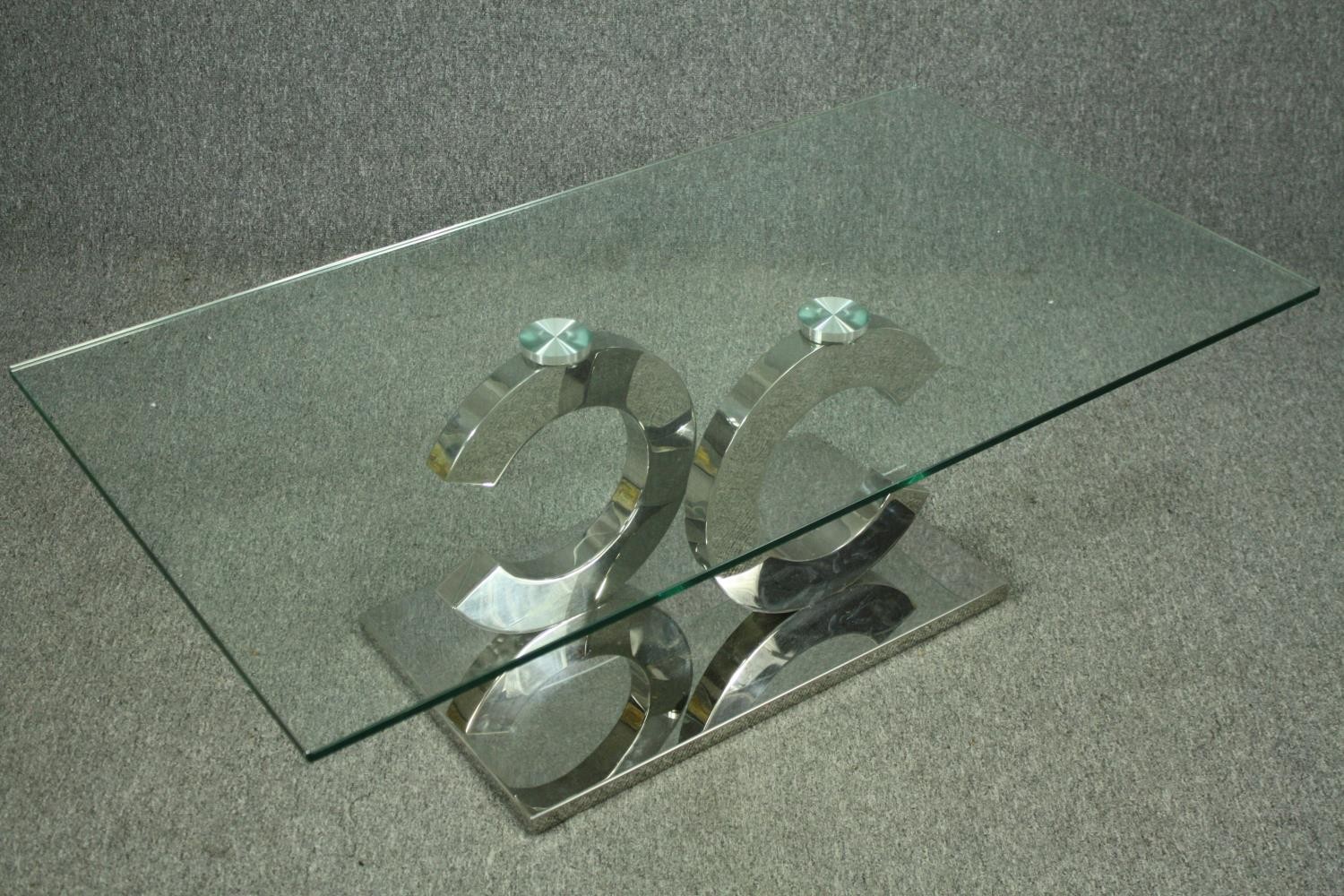 Coffee table, contemporary with plate glass top on a chrome base. H.42 W130cm. - Image 6 of 8