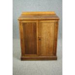 Pantry cupboard, C.1900 oak with panel doors enclosing shelves. H.107 W.87 D.51cm.