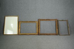 A collection of four picture frames. H.80 W.90cm. (largest).