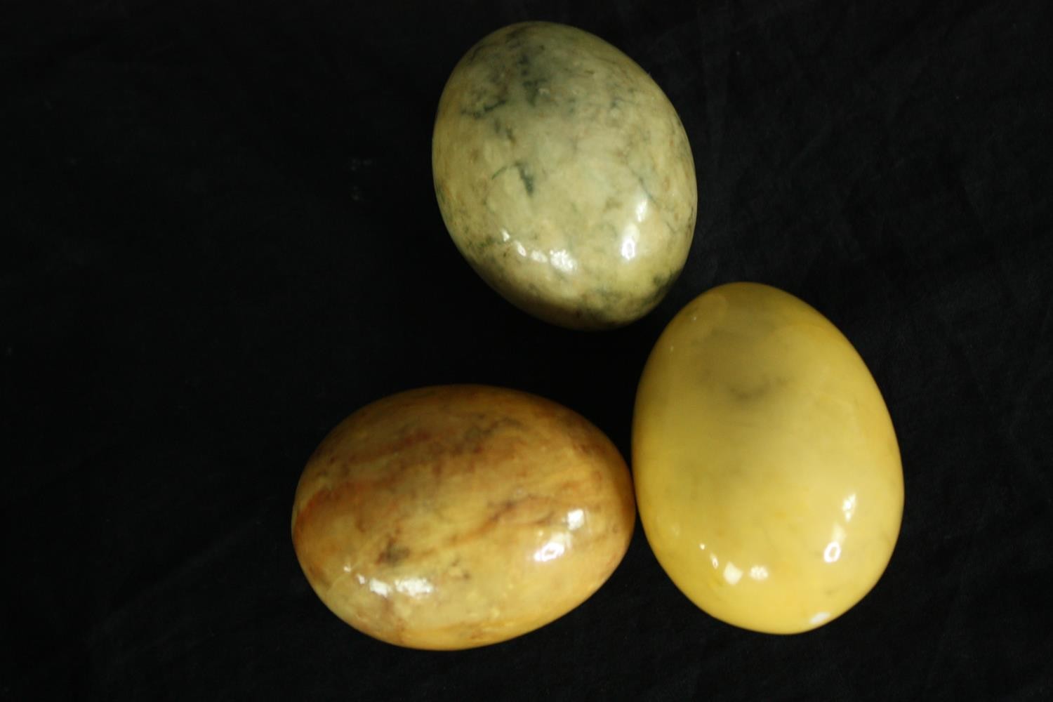 A collection of polished hardstone eggs including two hand decorated. H.7cm. (largest) - Image 3 of 6