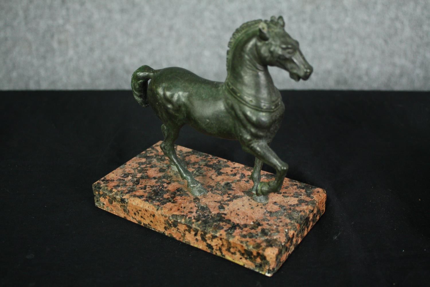 A bronze horse figure, a plaster faun mask and a brass figure. H.18 W.14cm. (largest). - Image 5 of 8