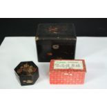 Two Japan lacquered and hand decorated boxes along with boxed glass meditation balls. H.13 W.16 D.