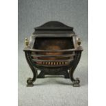 A vintage steel and cast iron fire grate in the Regency style. H.63 W.58 D.29cm.