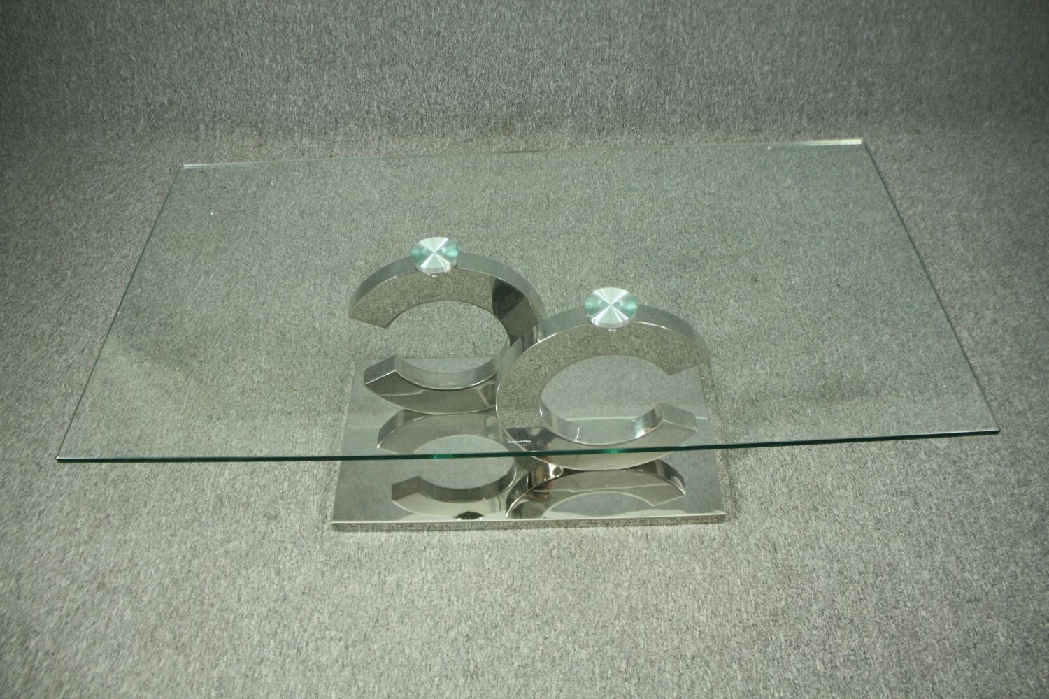 Coffee table, contemporary with plate glass top on a chrome base. H.42 W130cm. - Image 2 of 8