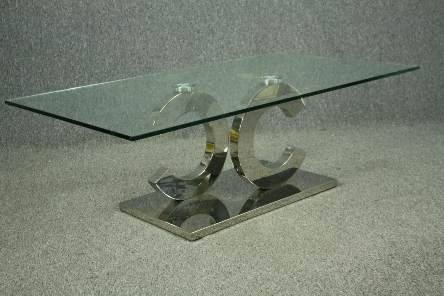 Coffee table, contemporary with plate glass top on a chrome base. H.42 W130cm. - Image 5 of 8