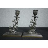 A pair of bronze candlesticks of naturalistic form. H.20 cm. (each)