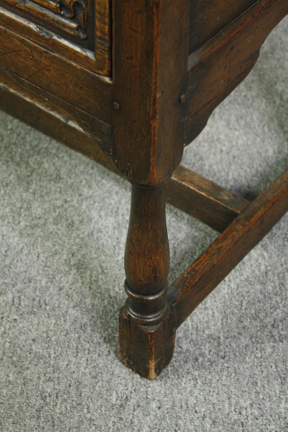 A mid century Ipswich oak side cabinet in the Jacobean style with carved flowerhead and linen fold - Image 9 of 9