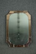 An Art Deco wall mirror with peach glass borders. H.77 W.51cm.