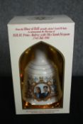 A box of six unopened Bell's Scotch whisky decanters. H.26cm. (each)