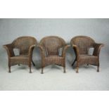 Three wicker conservatory armchairs. Marks and Spencer. H.82cm. (each).