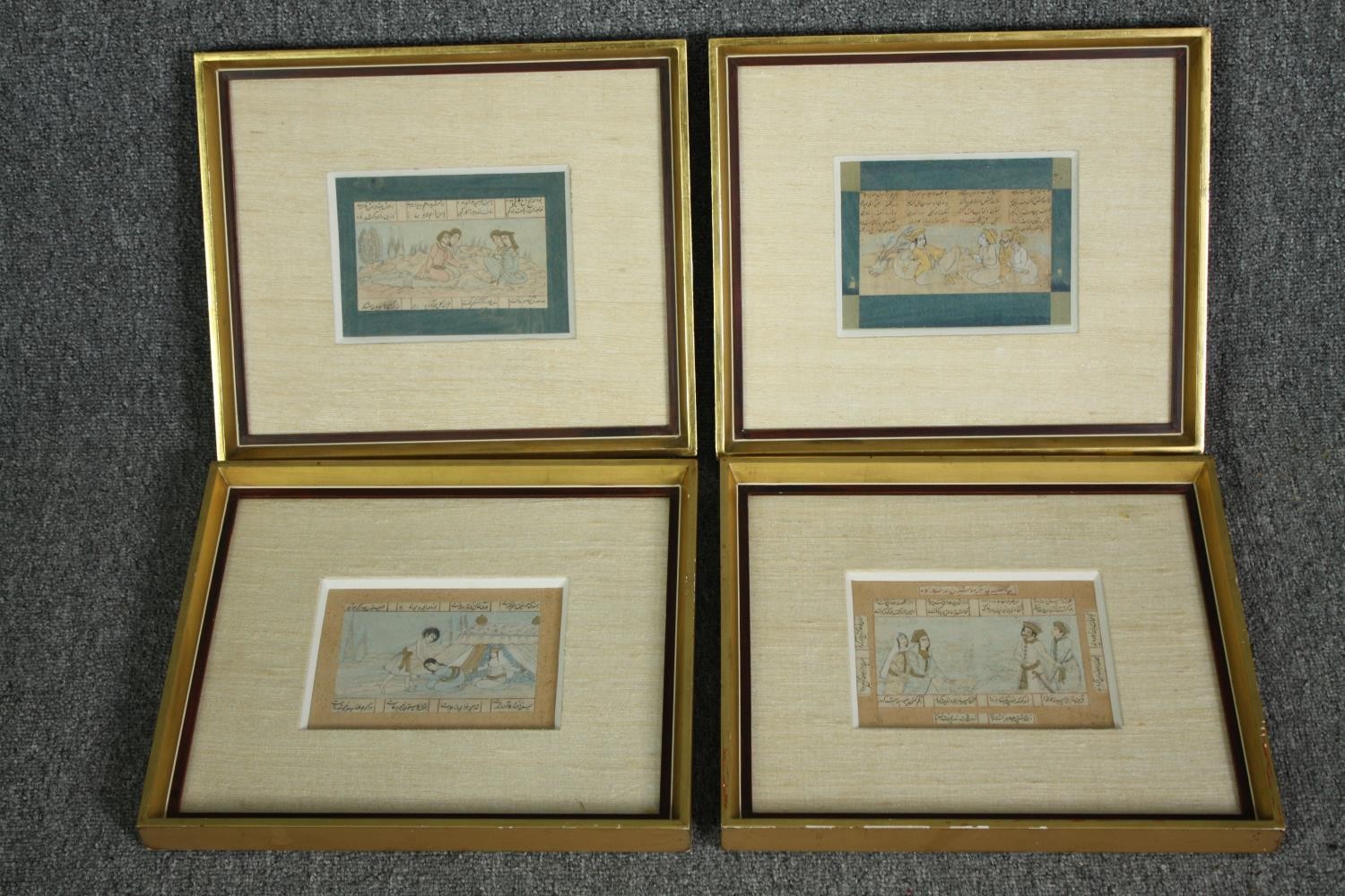 A set of four Indo Persian drawings on paper, groups of figures, framed and glazed. H.32 W.37cm. (