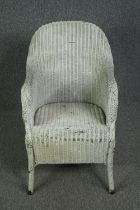 A vintage Loom style armchair. H.88cm.