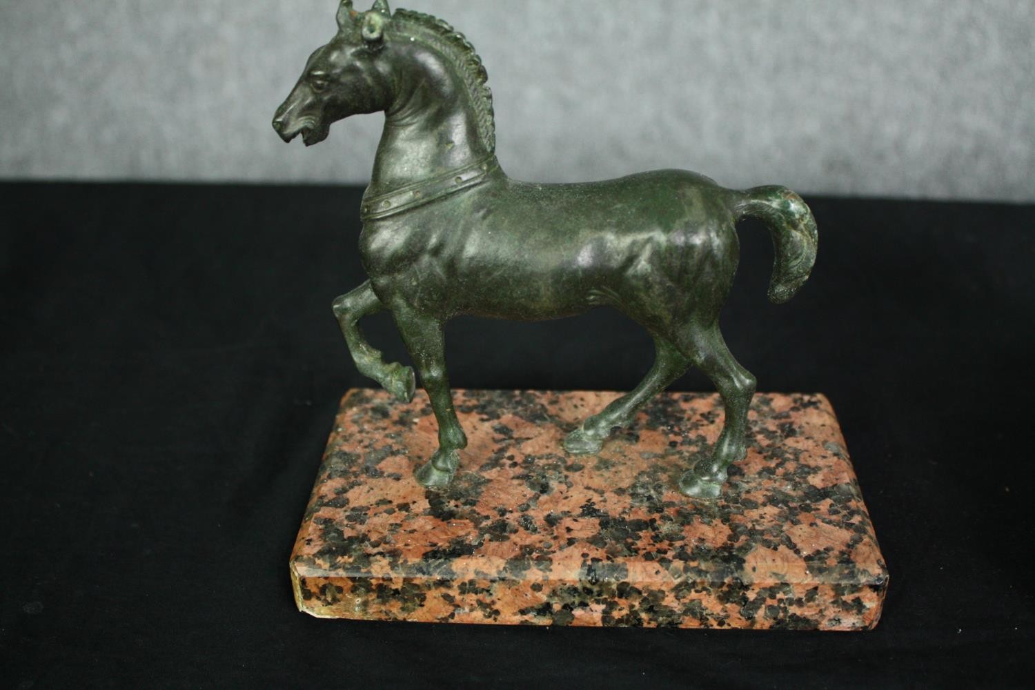 A bronze horse figure, a plaster faun mask and a brass figure. H.18 W.14cm. (largest). - Image 4 of 8