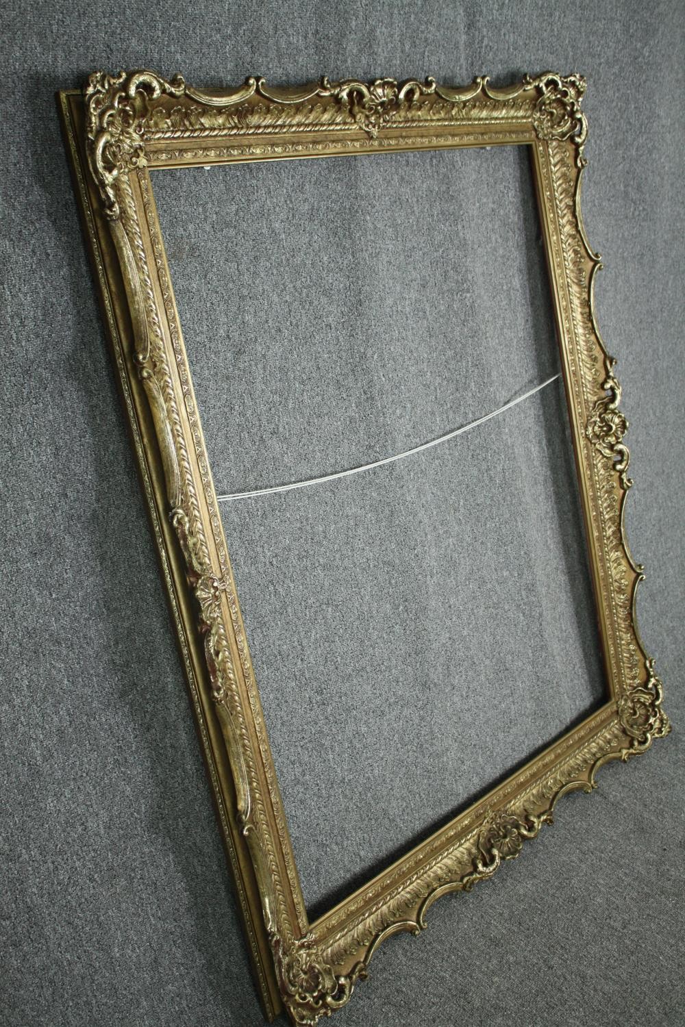 A large giltwood and gesso picture or mirror frame. H.150 W.120cm. - Image 2 of 5