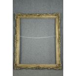 A large giltwood and gesso picture or mirror frame. H.150 W.120cm.