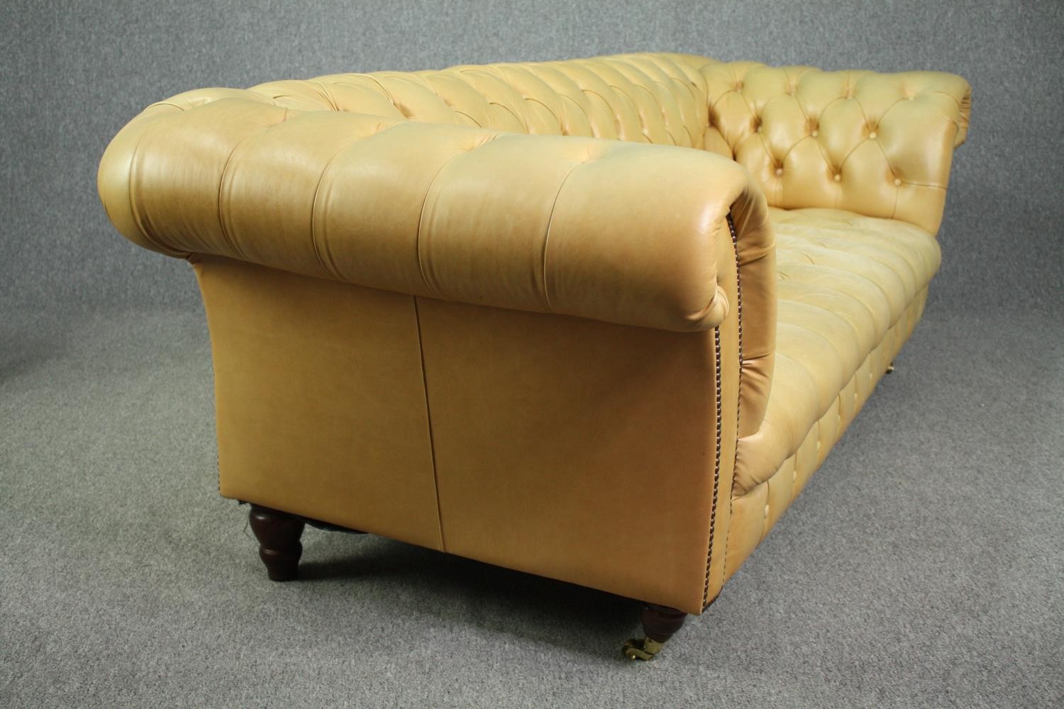 Chesterfield sofa, Victorian style in deep buttoned and studded leather upholstery raised on - Image 2 of 8