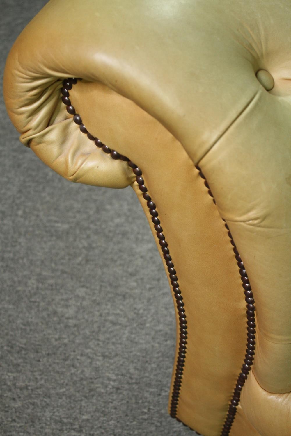 Chesterfield sofa, Victorian style in deep buttoned and studded leather upholstery raised on - Image 8 of 8