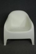 A contemporary moulded IKEA tub chair. H.71cm.