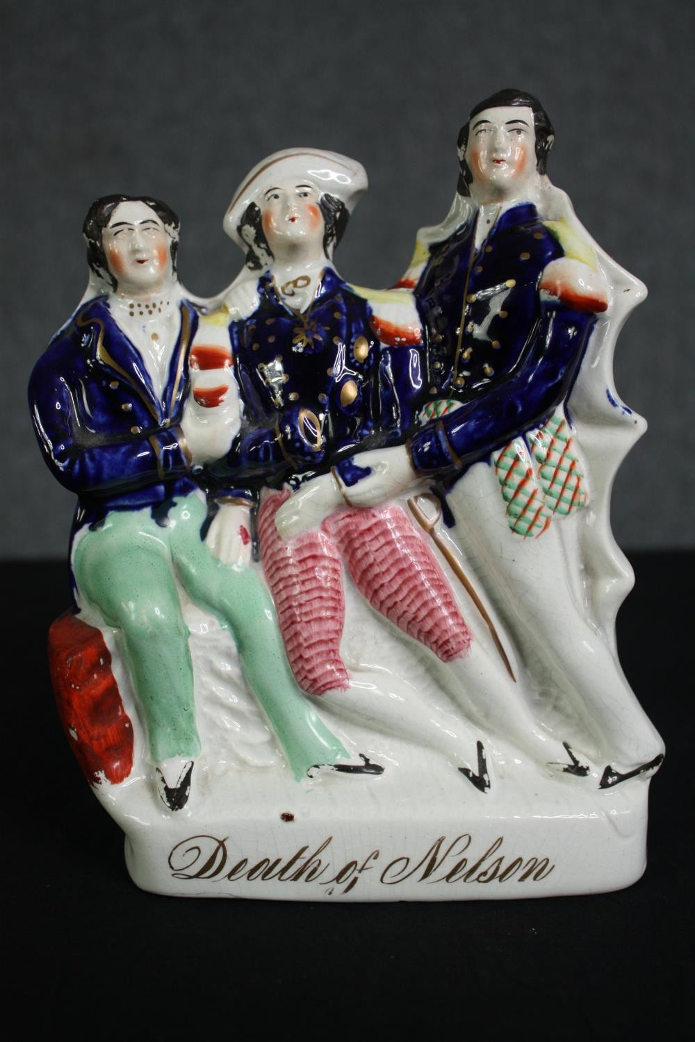 A rare mid 19th Century Staffordshire group, "Death of Nelson" H.23cm.