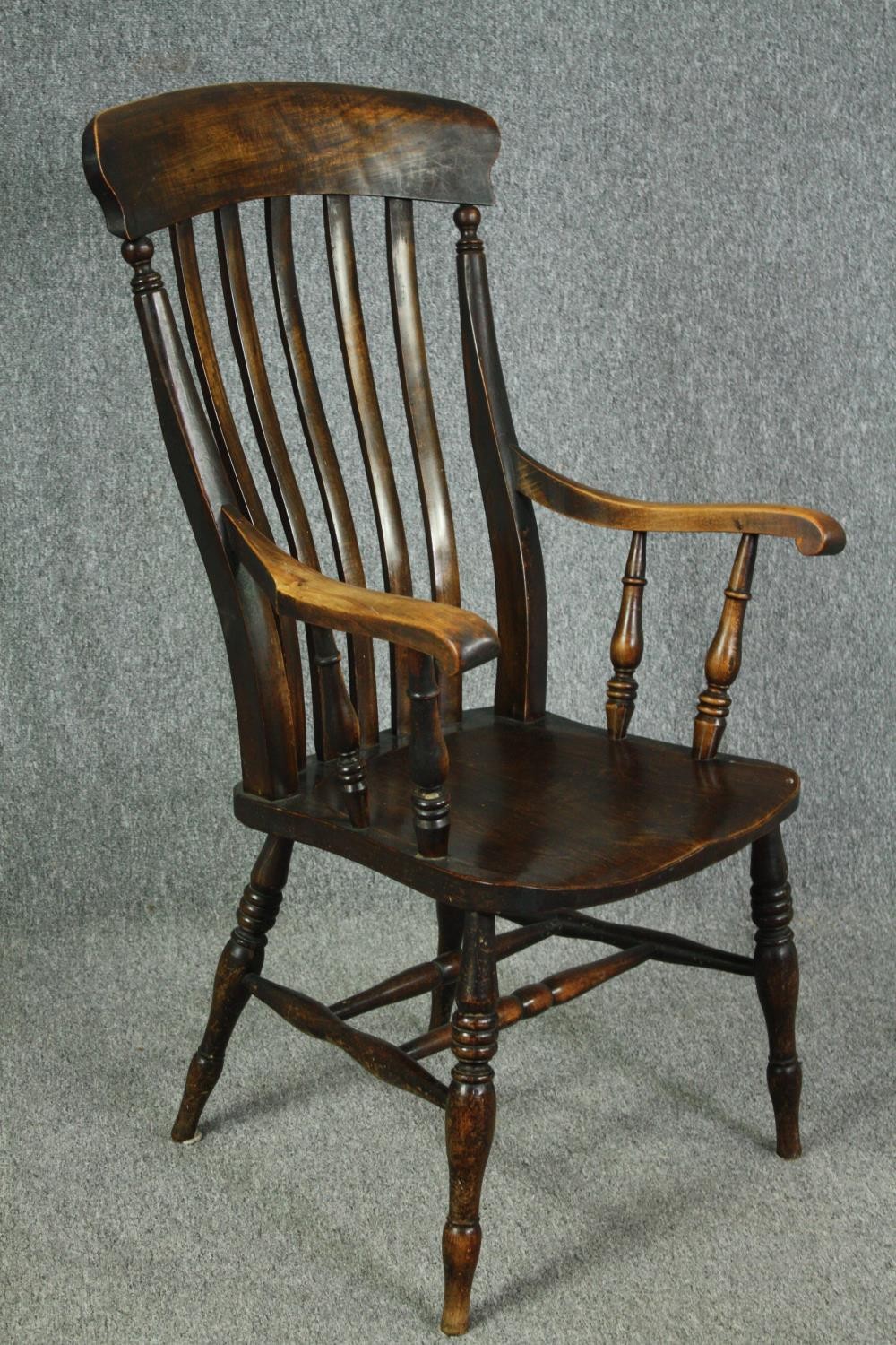 A 19th century beech and elm stick back kitchen armchair. H.114cm. - Image 2 of 5