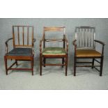 Two Georgian mahogany armchairs and a later similar chair.