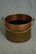 A 19th century copper and brass rivetted milk pail or bucket. H.23 Dia.31cm.