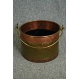 A 19th century copper and brass rivetted milk pail or bucket. H.23 Dia.31cm.