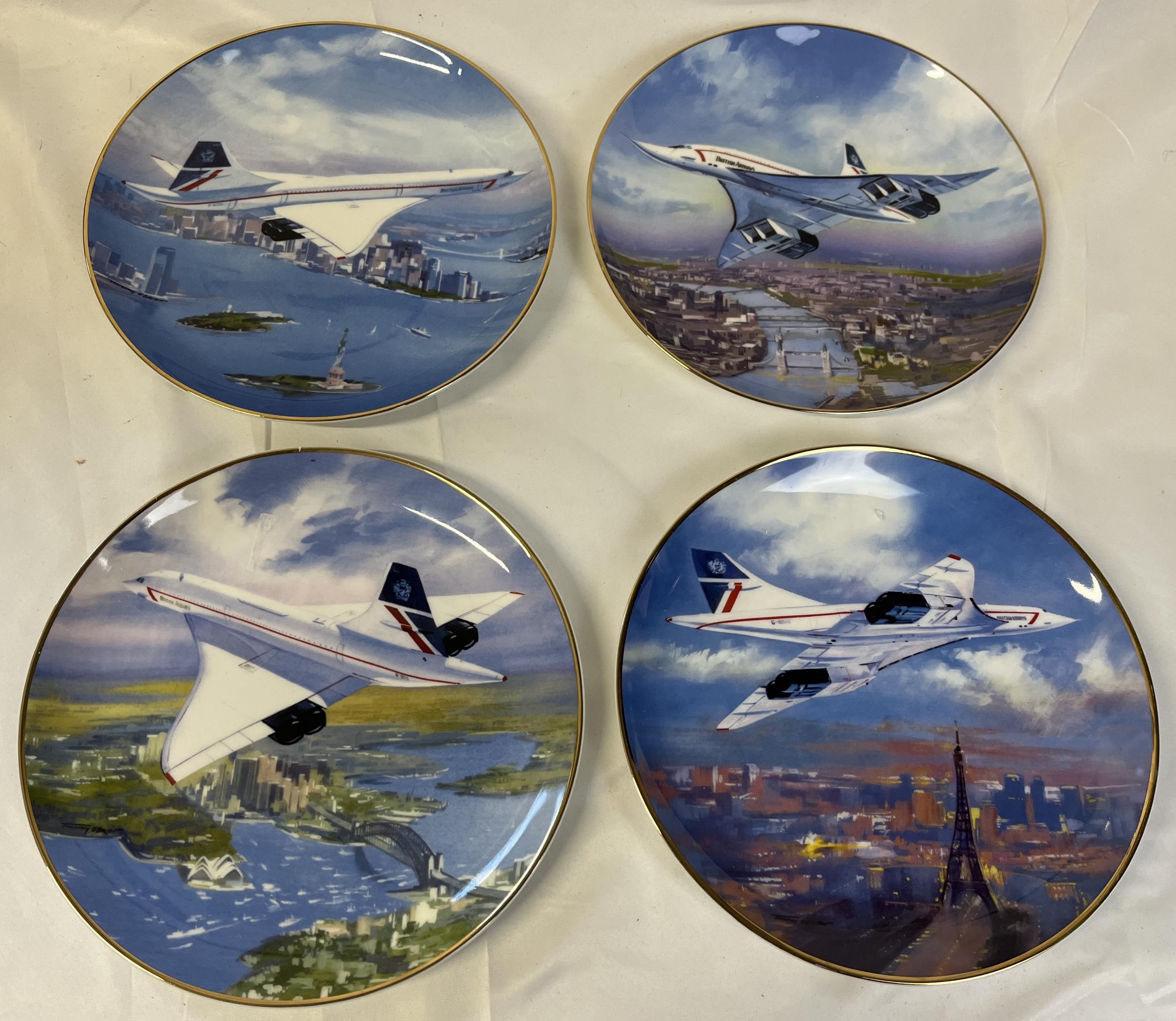 A set of four boxed commemorative Concorde plates by Tim O'Brien. Dia.20cm.