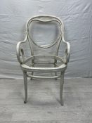 A late 19th century painted Thonet style armchair with scrolling arms and heart motif to the back.