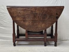 Dining table, 19th century oak with drop flap and gateleg action. H.122 D.90cm.