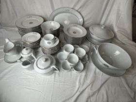 An extensive Limoges dinner service for twelve, a total of 84 pieces in new or nearly new condition,