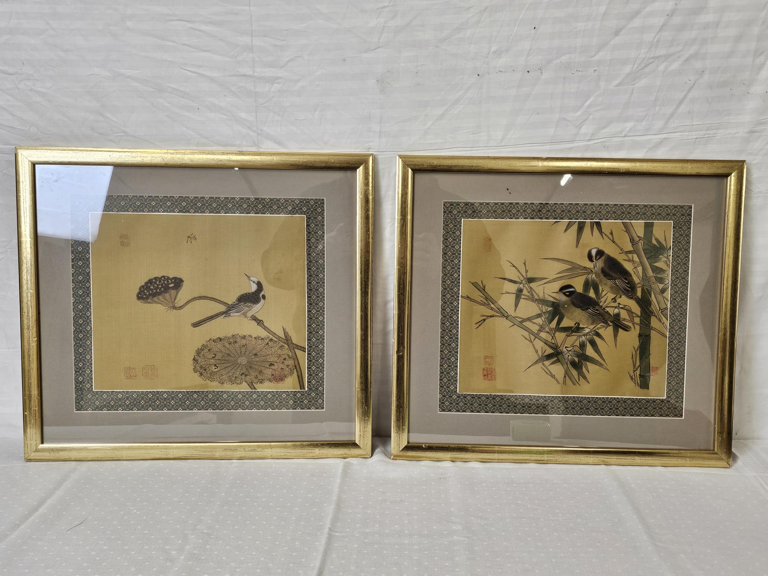 Two framed and glazed Japanese prints on silk. H.49 W.54cm.