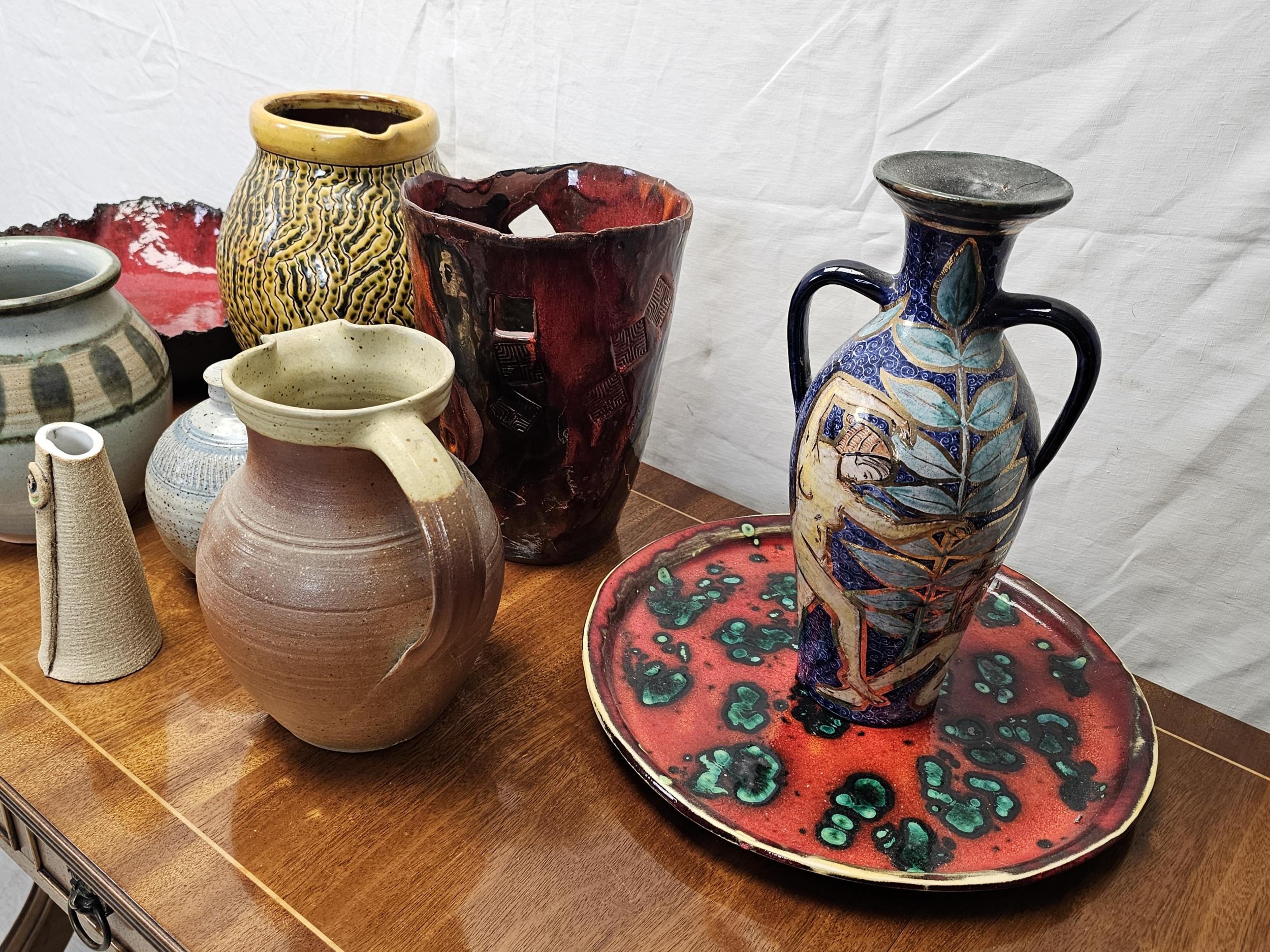 A miscellaneous collection of studio pottery, to include jugs, vases and plates. Tallest vase is - Image 3 of 5