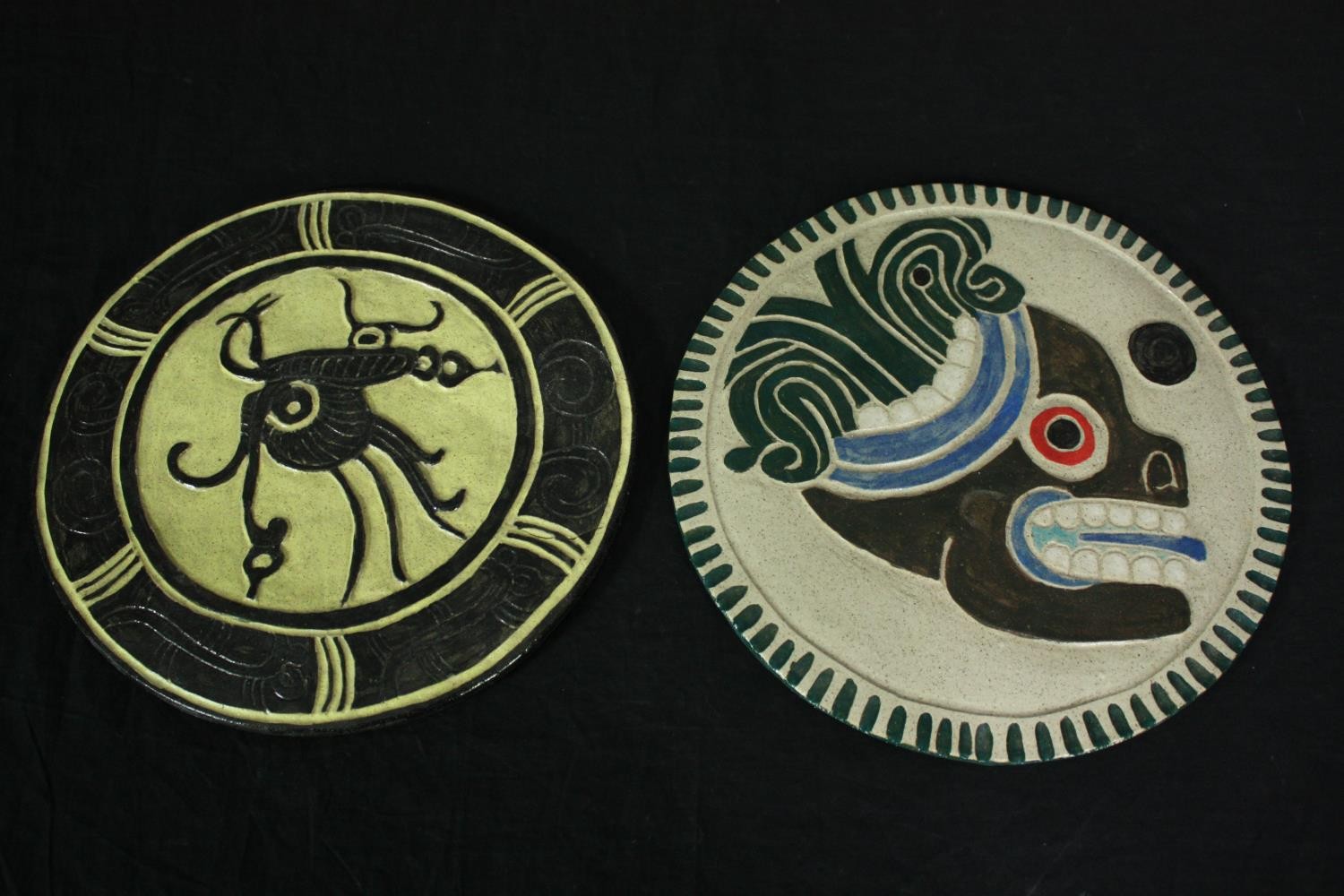 Two native American art pottery plaques. Dia.26cm. (each)