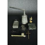 A miscellaneous collection of metalware, including a passionfruit flower letter clip, an Ottoman