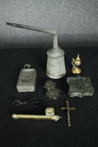 A miscellaneous collection of metalware, including a passionfruit flower letter clip, an Ottoman