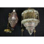 Two Eastern pendant light shade fittings. H.46cm. (largest).