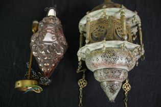 Two Eastern pendant light shade fittings. H.46cm. (largest).