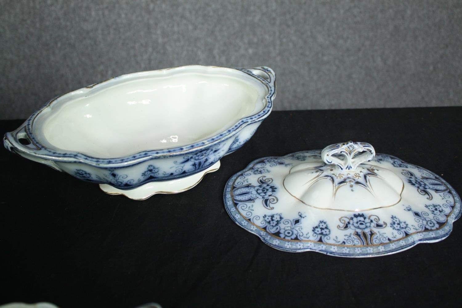 A 19th century blue and white part dinner service. H.33 W.24cm. (largest) - Image 7 of 9