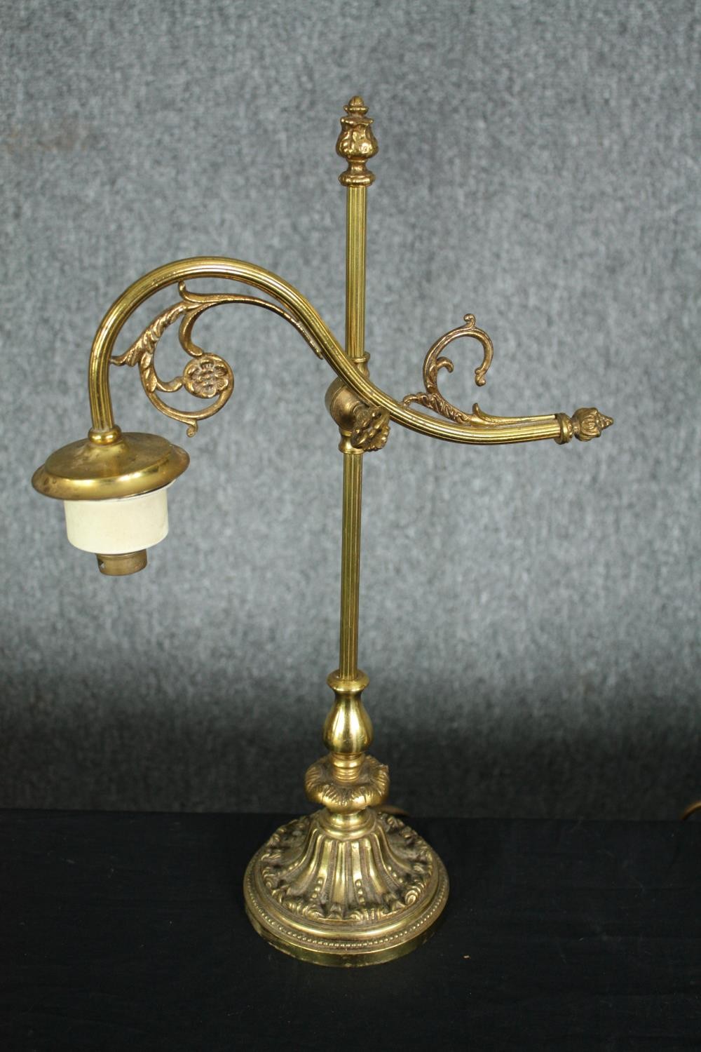 A miscellaneous collection of four brass table lamps to include a desk lamp with articulated - Image 5 of 7