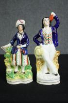 Two 19th century flatback Staffordshire figure groups. H.23cm. (largest)